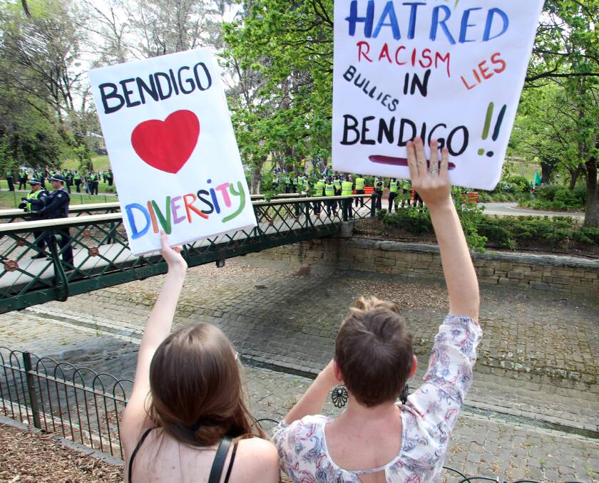Pro-diversity campaigners make their thoughts known as anti-mosquers rally in Rosalind Park. Right-wing groups gathered in the park in 2015. Picture: GLENN DANIELS
