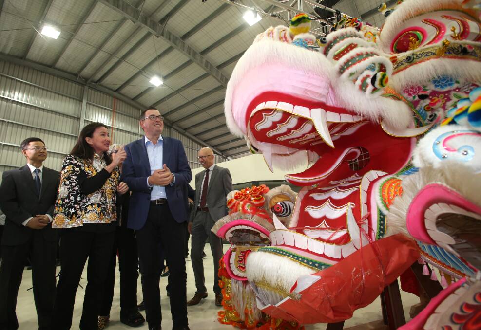Anita Jack and Victoria's premier Daniel Andrews meet Dai Gum Loong. Picture: GLENN DANIELS