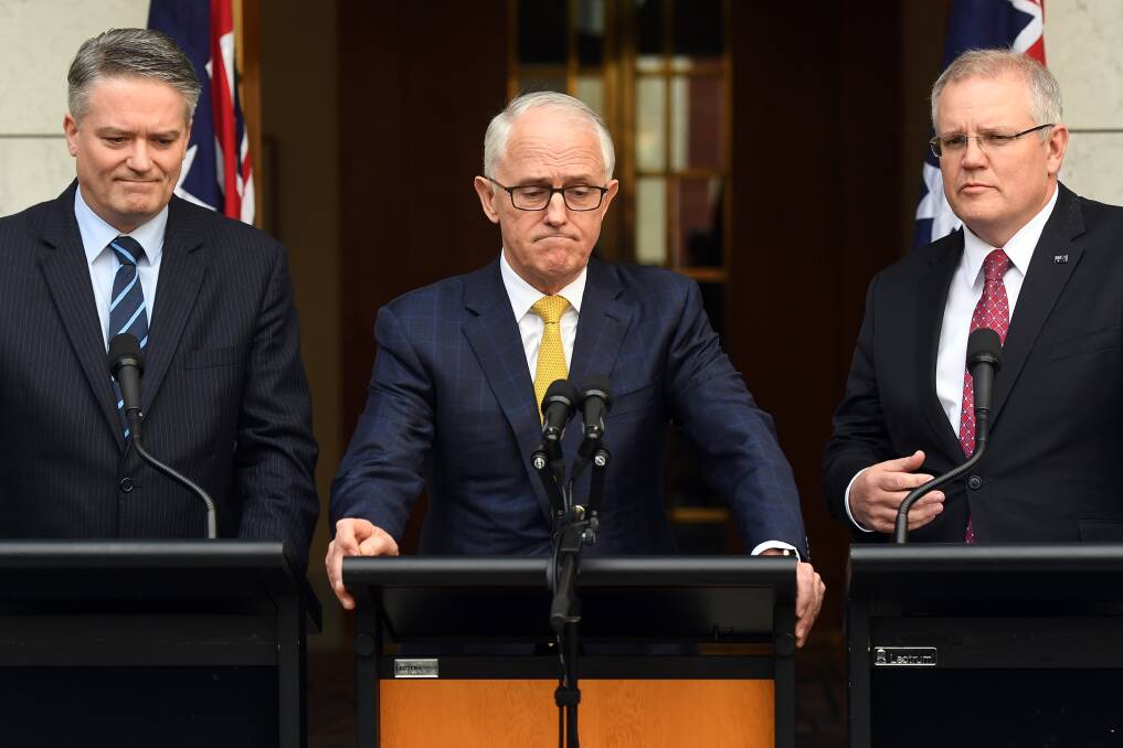 Mathias Cormann, then-prime minister Malcolm Turnbull and current-prime minister Scott Morrison speak during a press conference last Wednesday.  Picture: AAP Image/Sam Mooy