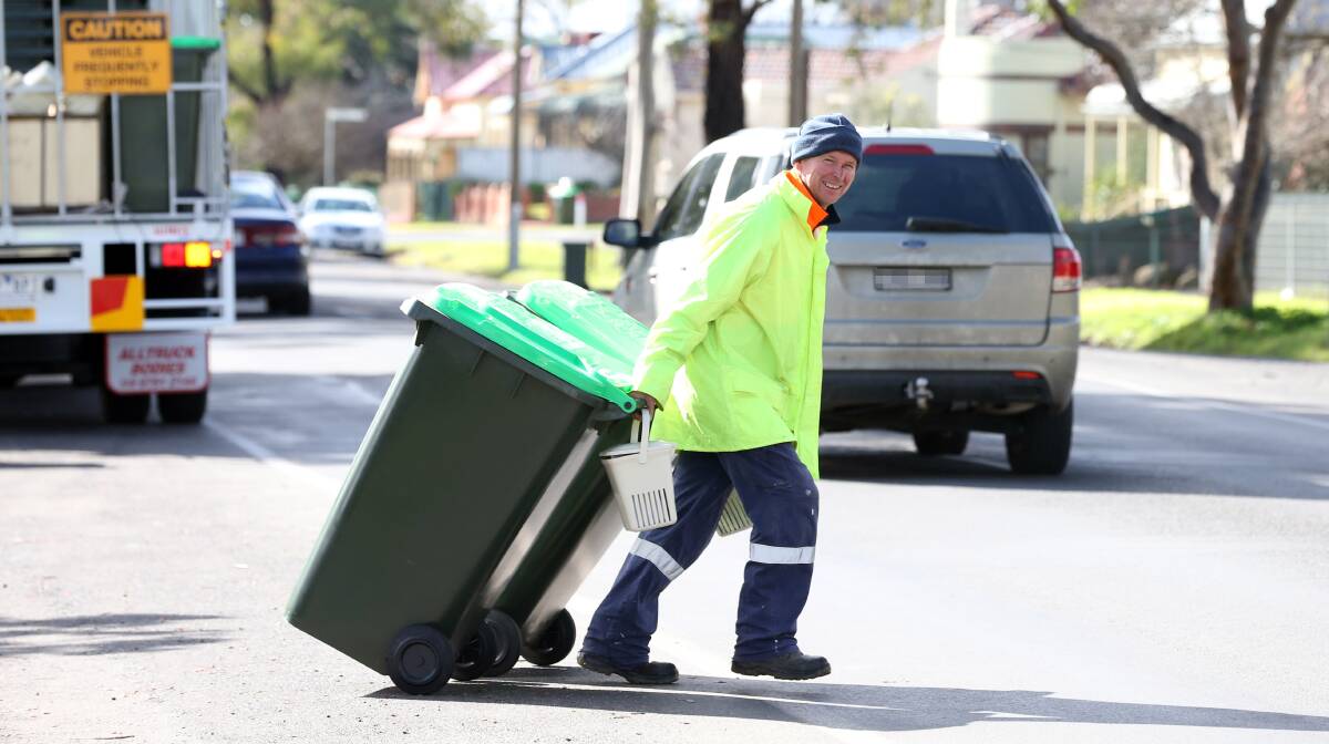 NO WASTE: Green waste bins were delivered in Golden Square last July. In the last two weeks the first full collection has taken place in Bendigo and Marong. Picture: GLENN DANIELS