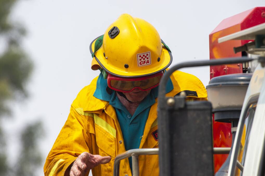 A firefighter at a bushfire. Picture: DARREN HOWE
