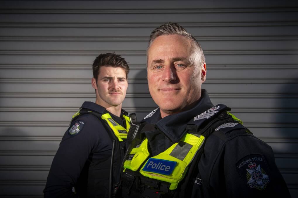 DYNAMIC DUO: Cohen and Tony Kekich prepare to patrol the streets of Bendigo. Cohen became a police officer several months ago and is following in the footsteps of his father Tony. Picture: DARREN HOWE