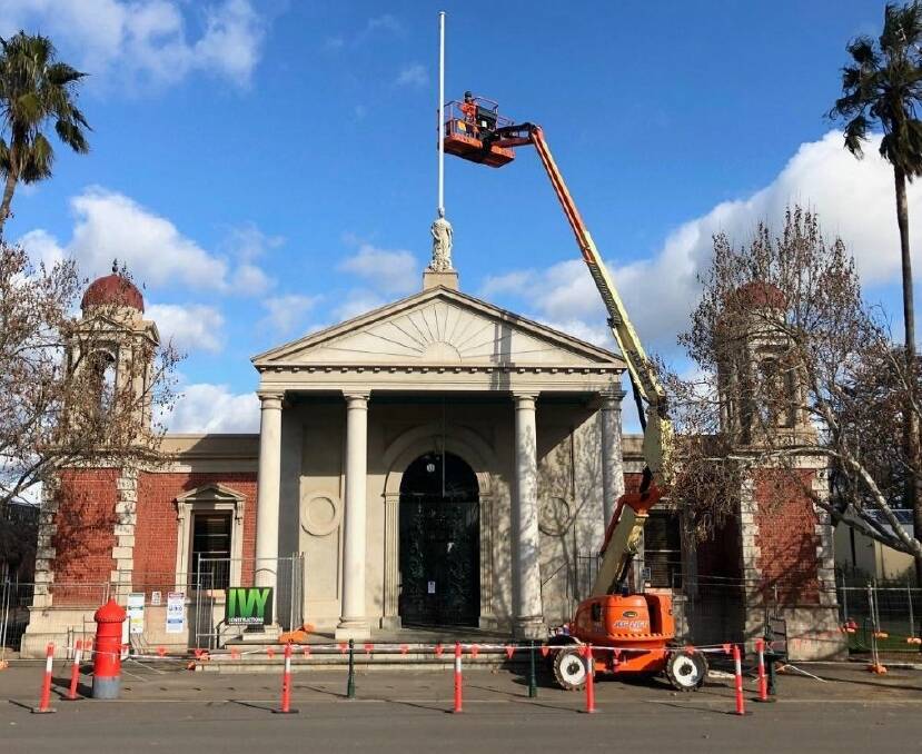A worker helps with Castlemaine Market Building improvement works late in 2020. Picture: SUPPLIED
