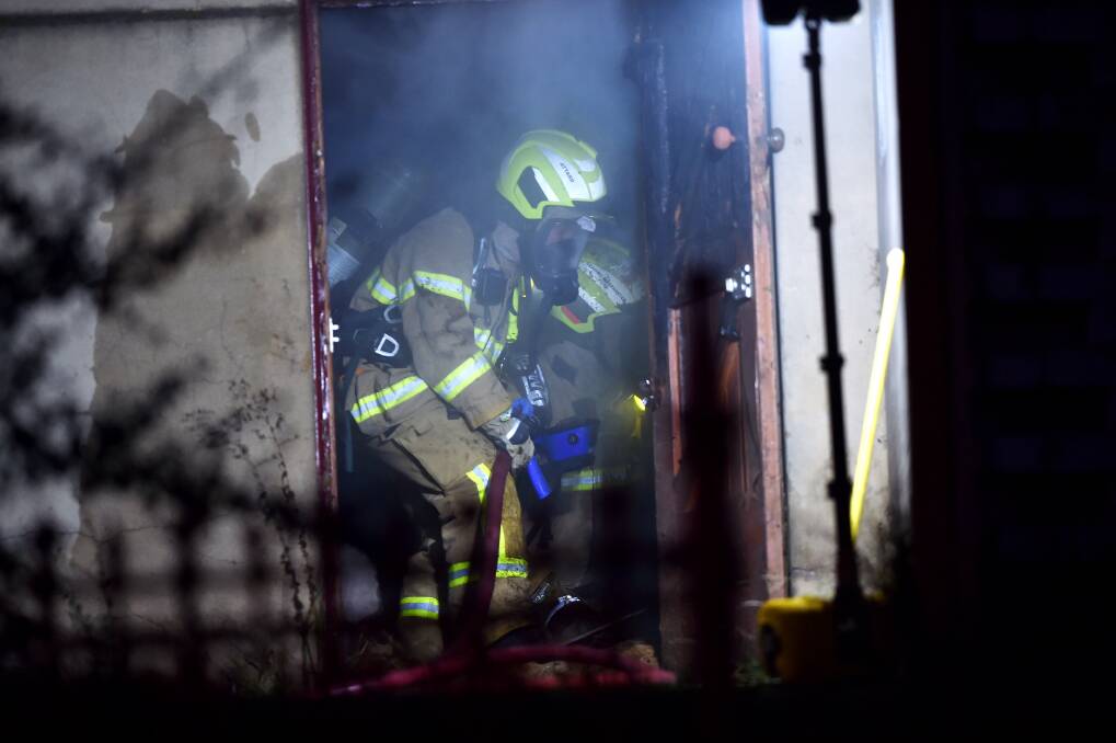 Firefighters dealing with a fire at the church in 2021. Picture: DARREN HOWE