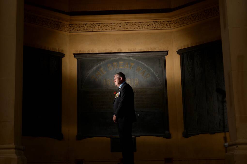 Peter Swandale takes a moment to reflect on the sacrifices of those involved in World War One. Picture: DARREN HOWE