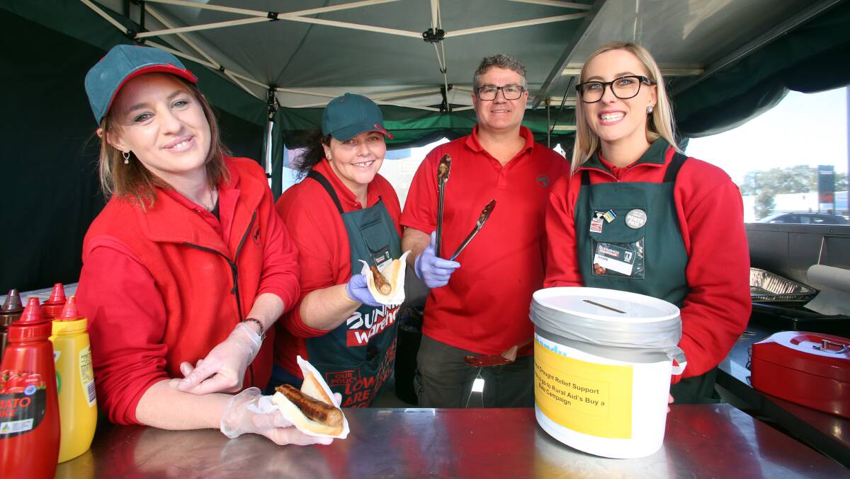 Staff at local Bunnings helped raise funds for Buy a Bale on Friday. Picture: Glenn Daniels