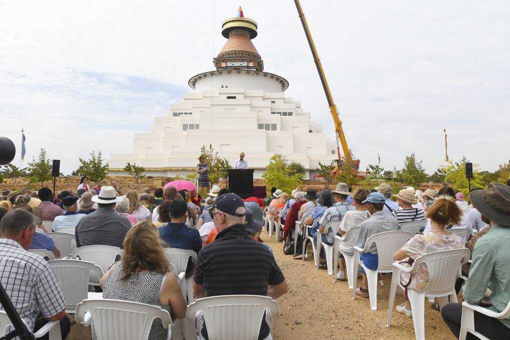 The Great Stupa of Universal Compassion in 2019, during a ceremony to mark the fitting out of a finial at the top of the building. Picture: NONI HYETT