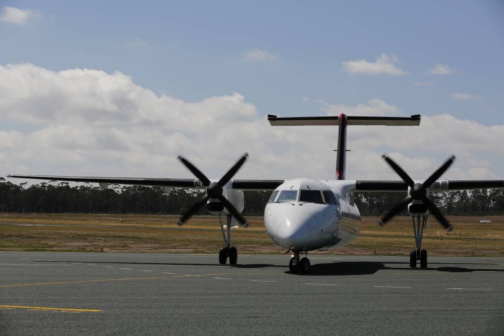 A QantasLink plane arrives from Sydney. Picture: EMMA D'AGNOSTINO