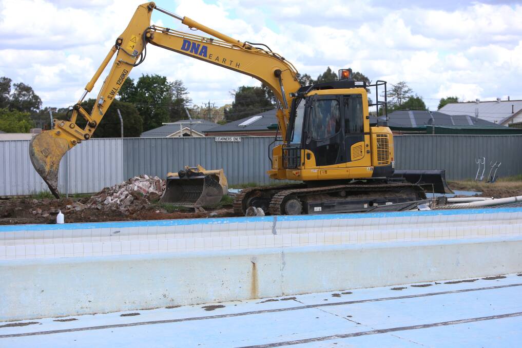 TIME TO GO: A Kangaroo Flat pool is demolished in 2018. More pools may need to be decommissioned, consultants have been warned. Picture: GLENN DANIELS