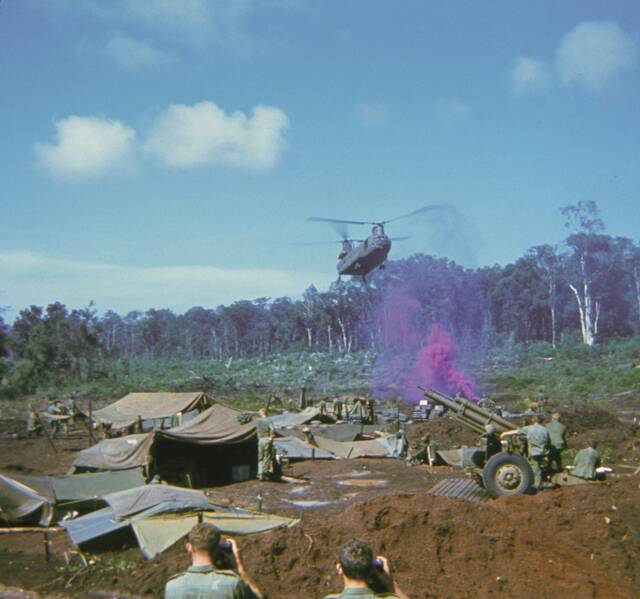 A US military helicopter lands supplies on the day Australians establish two "fire support bases" 4km apart. Picture: KEITH FOSTER, AUSTRALIAN WAR MEMORIAL