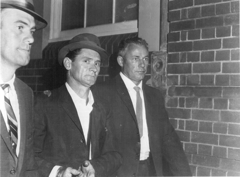 EXECUTED: After a prison guard's death and weeks on the run Ronald Ryan (centre) was found guilty of murder and sentenced to death. Picture: FAIRFAX MEDIA