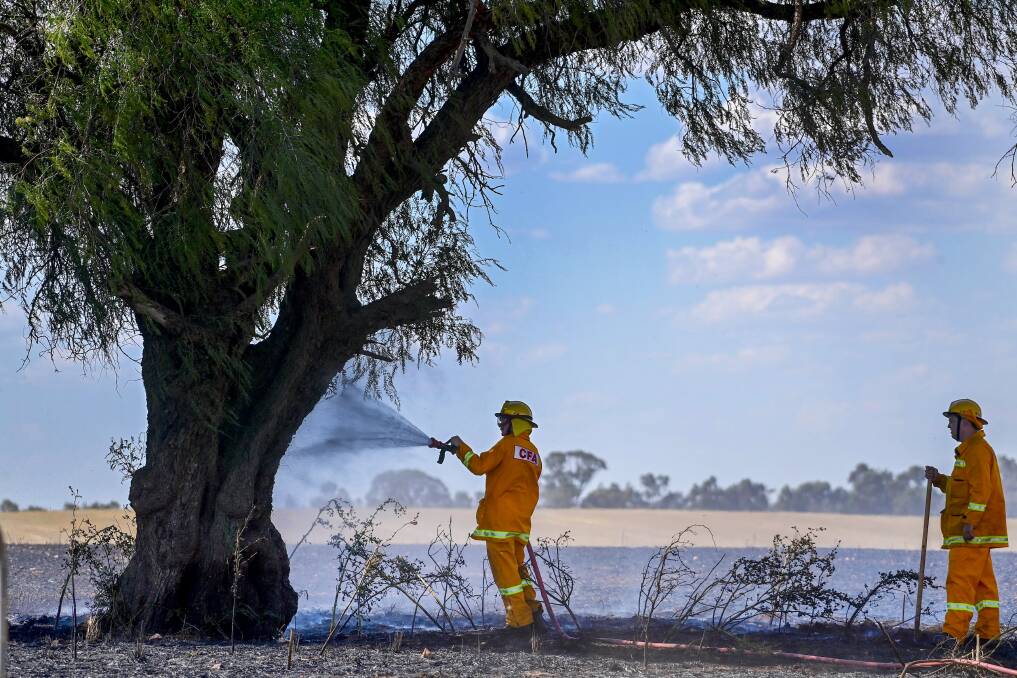 Firefighters at the scene of a fire in Marong on Monday. Picture by Brendan McCarthy.