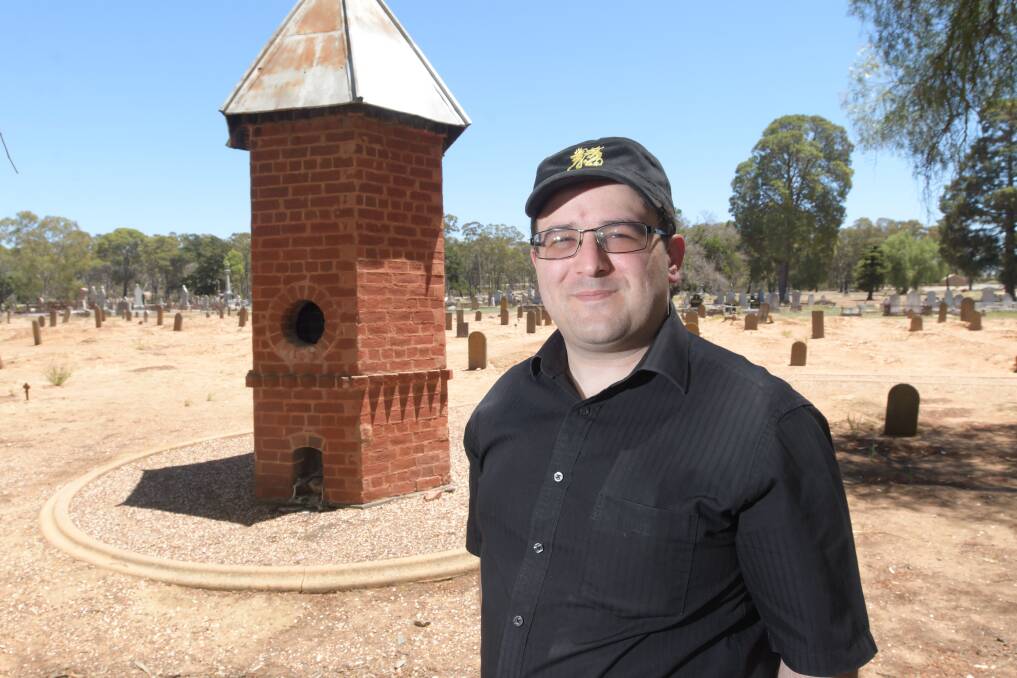 Golden Dragon Museum historian Leigh McKinnon in the Chinese section of a Bendigo cemetery. Picture: NONI HYETT