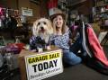 READY TO HELP: Millie Hawkins is raising funds for farmers and is calling for donations ahead of a garage sale. Her dog Ottis is helping out too. Picture: GLENN DANIELS