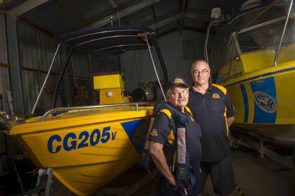 Bob Baker and Colin Ritchens at the Coast Guard base in Axedale. Picture: DARREN HOWE
