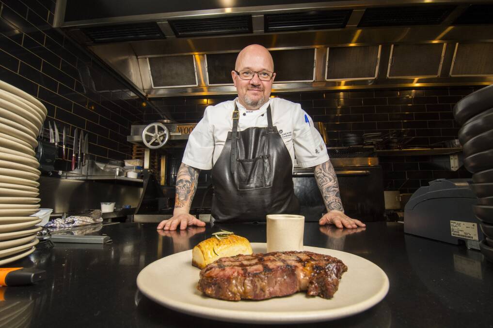 GOOD GRUB: Head chef and owner Paul Pitcher with the Cohuna Wagyu scotch fillet. Picture: DARREN HOWE