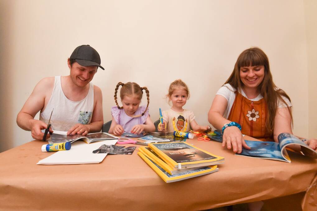 Joshua White and Alicia Huddy create zany collages with their children Josie and Harriet. Picture by Darren Howe.