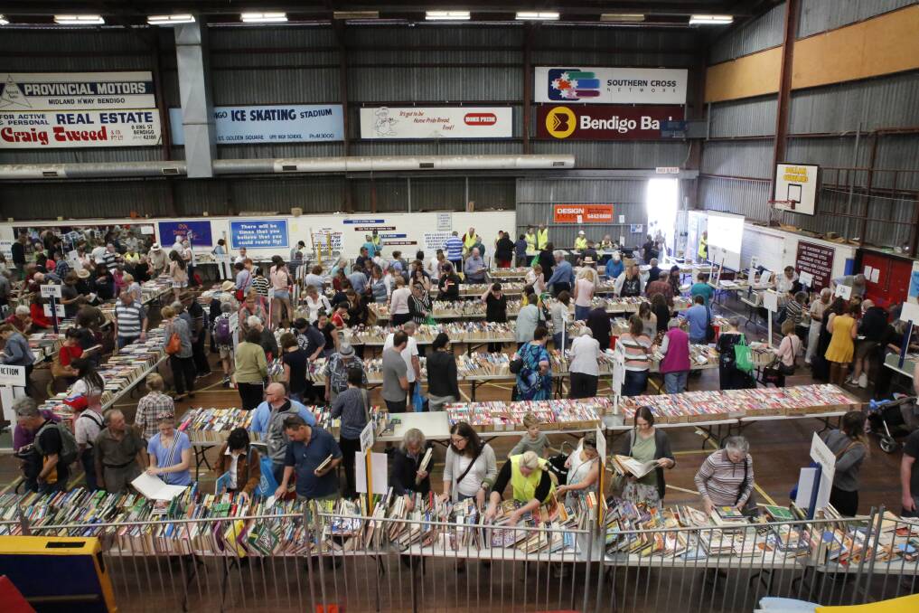 Crowds browse books for sale at an Easter sale. Picture is a file photo.