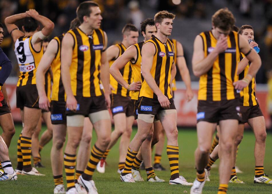 The Hawks after a loss in 2012. Picture: Sebastian Costanzo
