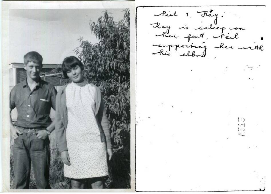 Words written on the back of the photograph read Neil and Kaye. Kaye is asleep on her feet, Neil is supporting her with his elbow.