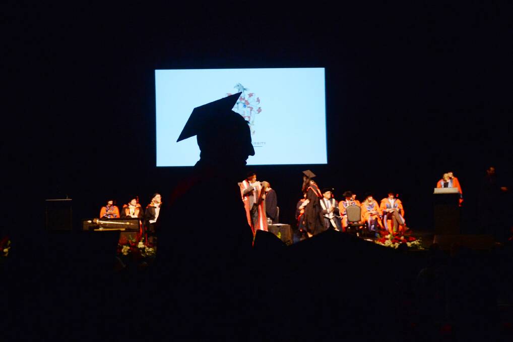 Students at a La Trobe University Bendigo graduation ceremony. Picture: DARREN HOWE