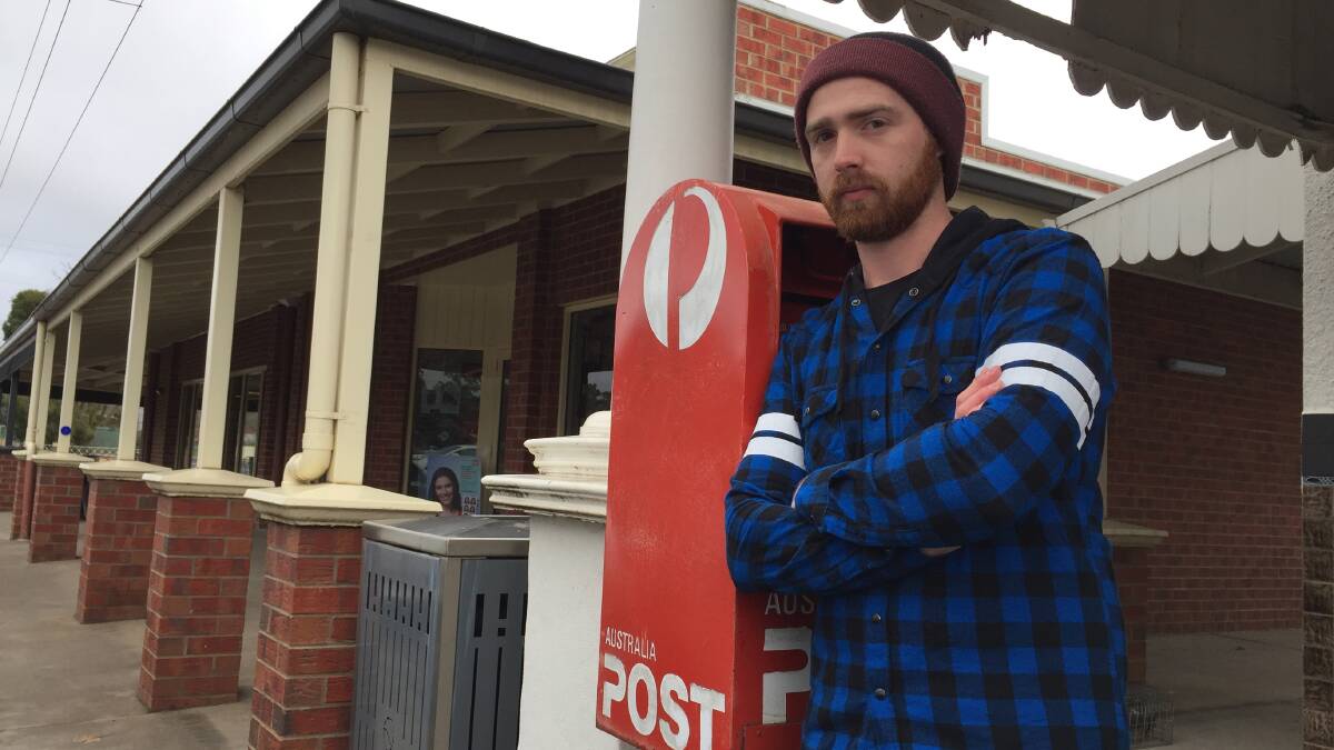 WAITING: Residents like Brady Stone must travel to the Huntly Post Office for mail. Picture: TOM O'CALLAGHAN