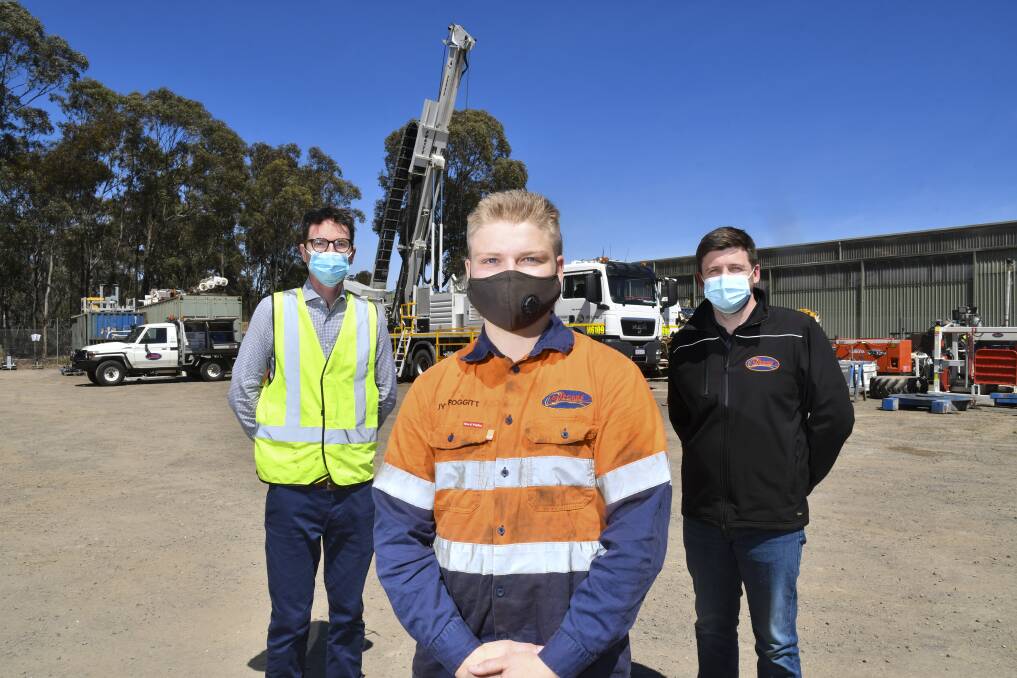 Gold miner Jye Foggitt (foreground) with the Minerals Council of Australia's James Sorahan and Deepcore Drilling chief executive Don MacDonald. Picture: NONI HYETT
