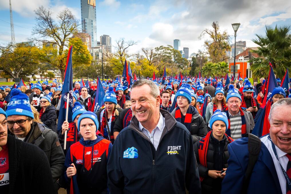 BIG FREEZE: Neale Daniher leads Melbourne Football Club supporters on the Walk to the 'G to raise awareness for Motor Neuron Disease. Picture: Chris Hopkins/Fairfax Media