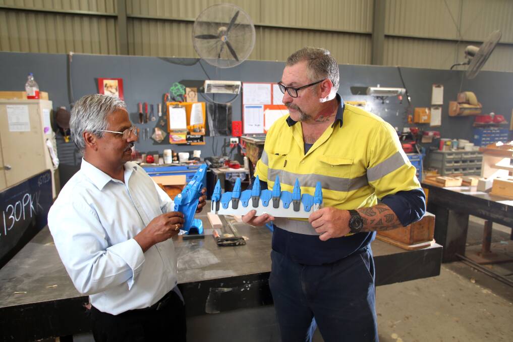 BIG PLANS: Keech Casting's Bala Hebbar and Brad Clark with products the company has designed for mines. Picture: GLENN DANIELS