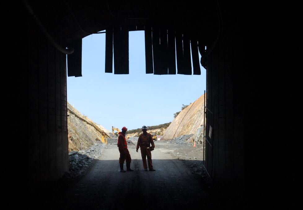 Miners inspect the entrance to the Kangaroo Flat portal in 2005. Picture: LAURA SCOTT
