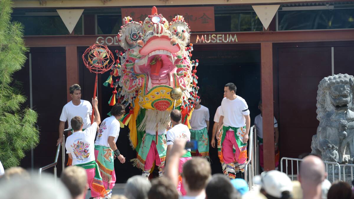 Sun Loong leaves the Golden Dragon Museum to greet Easter crowds. Soon his home might get a rennovation.