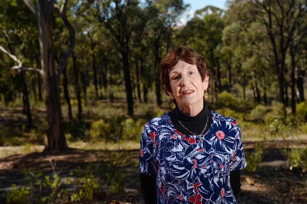 TOO MANY FAILURES: Kangaroo Flat resident Mary Markey stands in front of land that multiple companies have tried to turn into a viable min esite. Picture: DARREN HOWE