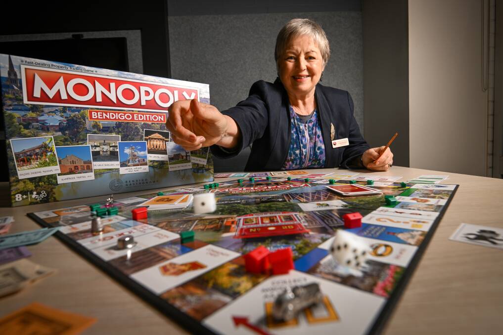Deputy mayor Jen Alden tries out the new Bendigo edition of Monopoly. Picture By Darren Howe.
