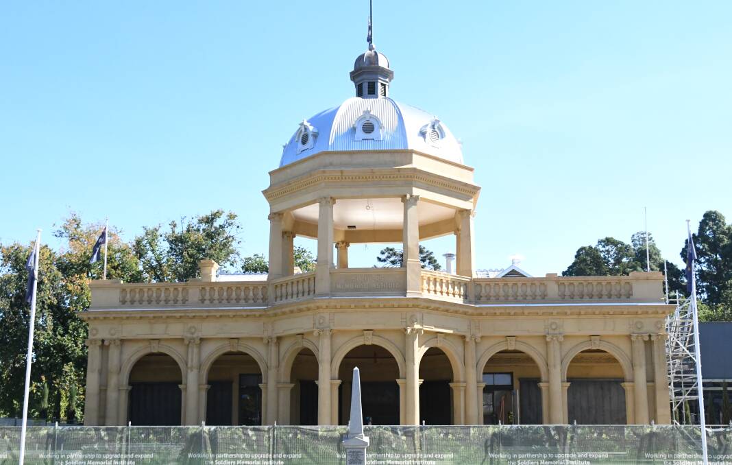 TIME FOR A CHANGE: Scaffolding is being taken down at the Bendigo Soldiers Memorial Institute, revealing a new colour.