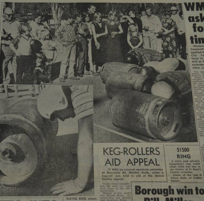 Racers but heads with kegs during an unusual race in the 1980s. Image: BENDIGO ADVERTISER/BENDIGO REGIONAL ARCHIVES CENTRE
