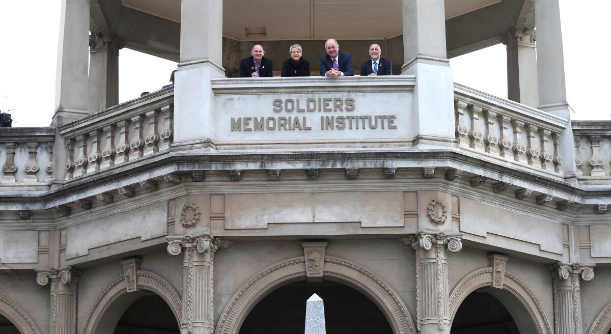 Then and now: Volunteer curator Peter Bell, Member for Bendigo West Maree Edwards, Minister for Planning Richard Wynne, and Bendigo District RSL's Paul Penno announce state government funding for the Soldiers Memorial Institute in 2016.