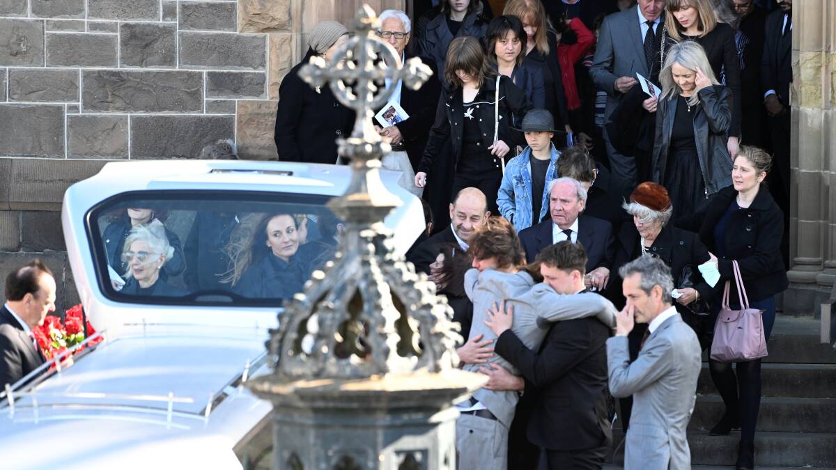James Frangos' coffin is led off by a hearse. Picture by Lachlan Bence
