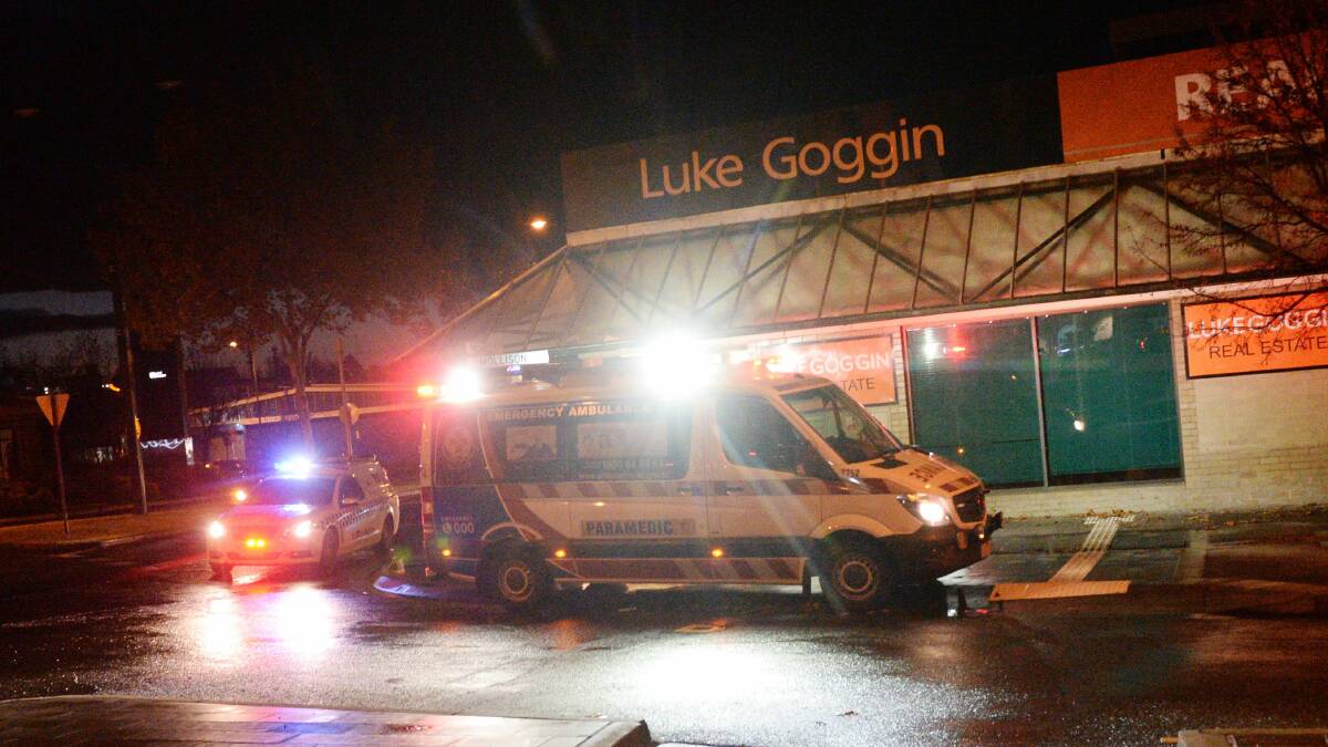 Pedestrian hurt: A man was hit by a car on Mitchell Street, Bendigo on Monday night. Ambulance and police attended. Picture: DARREN HOWE.