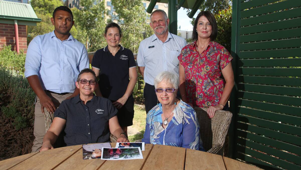 Members of the Bendigo Health palliative care team with Annie Young, whose husband Robert was cared for at home. Picture: GLENN DANIELS