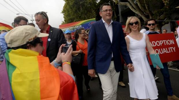 The Victorian Premier Daniel Andrews, with his wife Catherine, at the annual Pride March in St Kilda in 2015. The Premier will issue an apology on May 24, 2016, for laws that once criminalised homosexuality. Photo: Penny Stephens