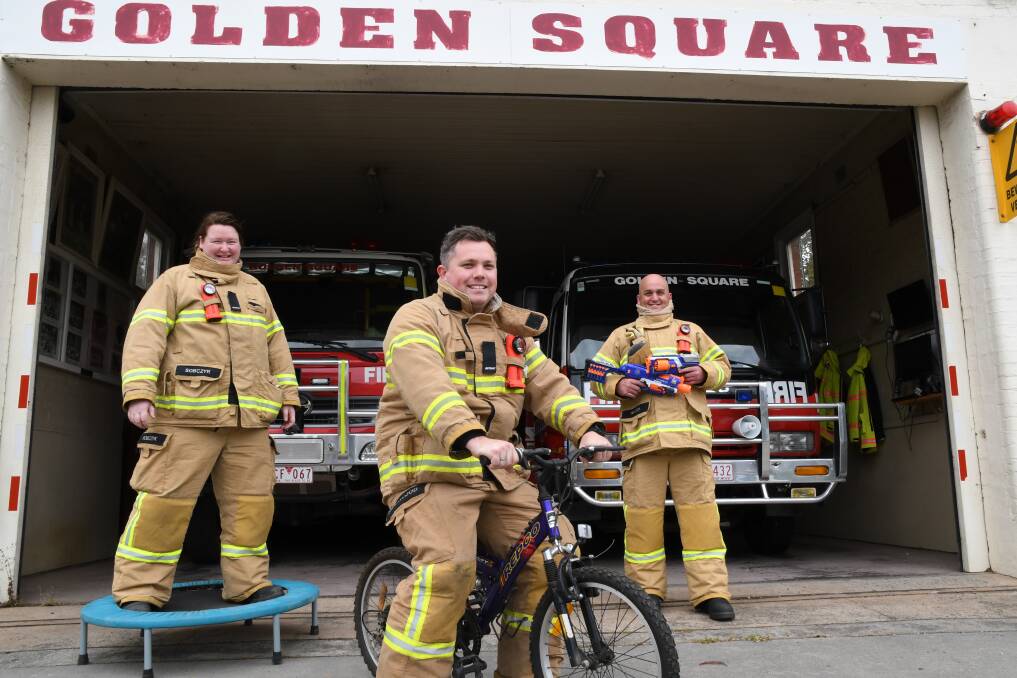 Golden Square firefighters Chantelle Sobczyk, Bryan Greenwood and Jamie Waugh with some of the items on offer at the brigade's annual garage sale fundraiser this coming Saturday.
