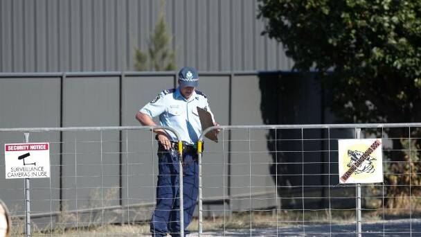 Police at the scene of last night's dog attack on the nine-year-old boy who is now in a Melbourne hospital. Picture: RIVERINE HERALD