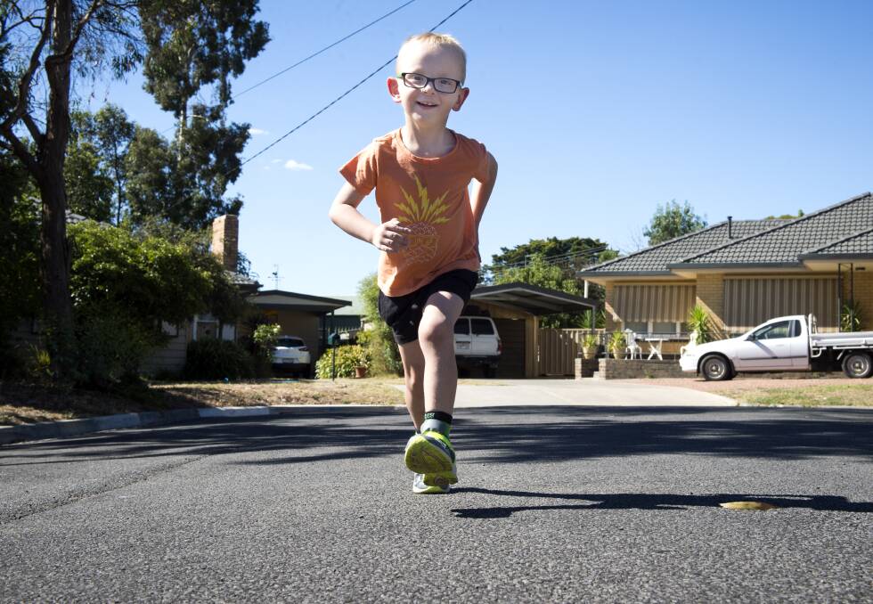 Six-year-old Dylan who has cerebral palsy this year joined Bendigo Little Athletics and is loving every minute of it. Picture: DARREN HOWE