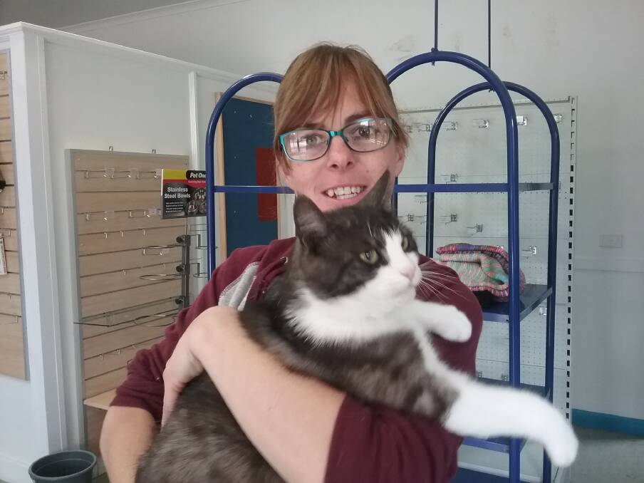 Shelter manager and Mount Alexander Animal Welfare vice-president Rosey Skinner with one of the cats at the Castlemaine site. Picture: SUPPLIED