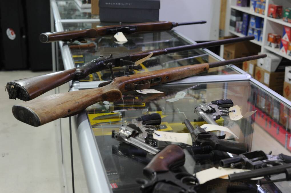 SURRENDERED: Some of the guns that were handed to Hartley's Hunting & Fishing during the firearm amnesty. Picture: NONI HYETT