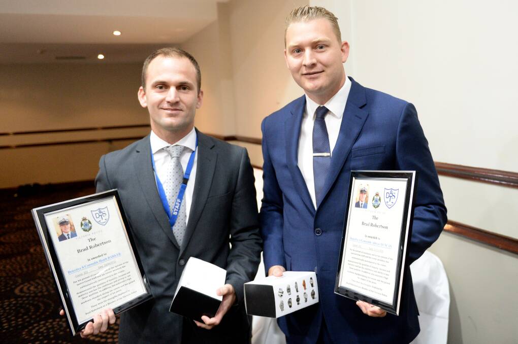 EXCELLENCE: Detective Senior Constable Alistair Duncan and Detective Senior Constable Heath Barker with their Brad Robertson Awards.