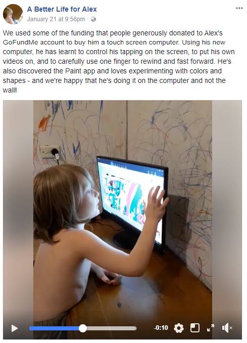 Alex using his touch-screen computer, bought with donations to Alex's GoFundMe account last year. Source: A Better Life for Alex/Facebook