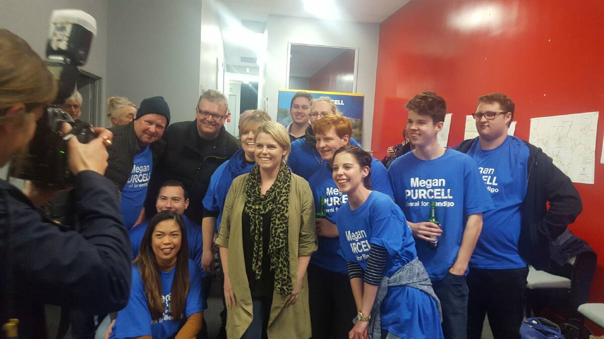 Liberal candidate for the seat of Bendigo Megan Purcell with supporters.