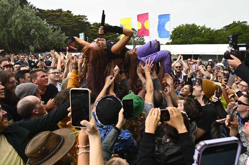 RedHook lead singer Emmy Mack crowd surfs off the Basquiat stage at Spilt Milk Ballarat 2023. Picture by Adam Trafford