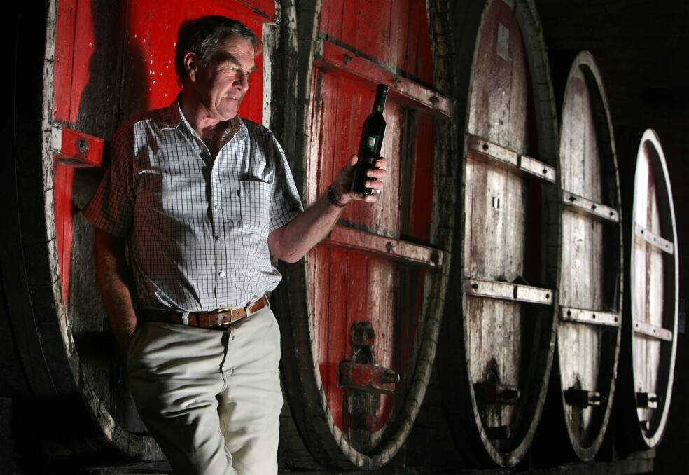 Reflective moment: Colin Campbell pictured in 2010 with the Merchant Prince Rare Rutherglen Muscat that has scored 100 points from Wine Spectator magazine, a first for an Australian wine.
